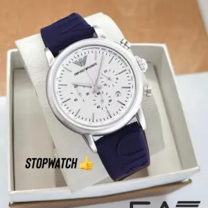 green and silver ring