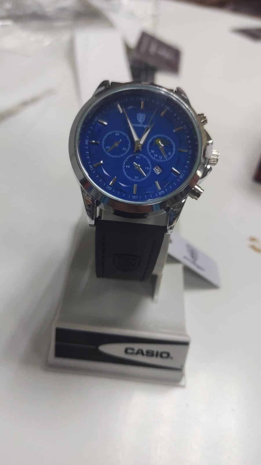 Black strap silver ring with blue dial